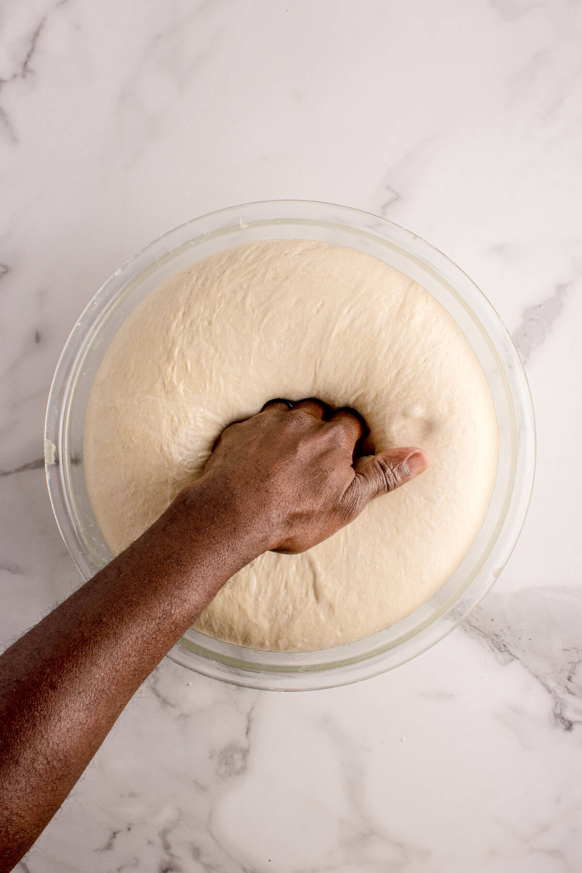 Deflating the dough