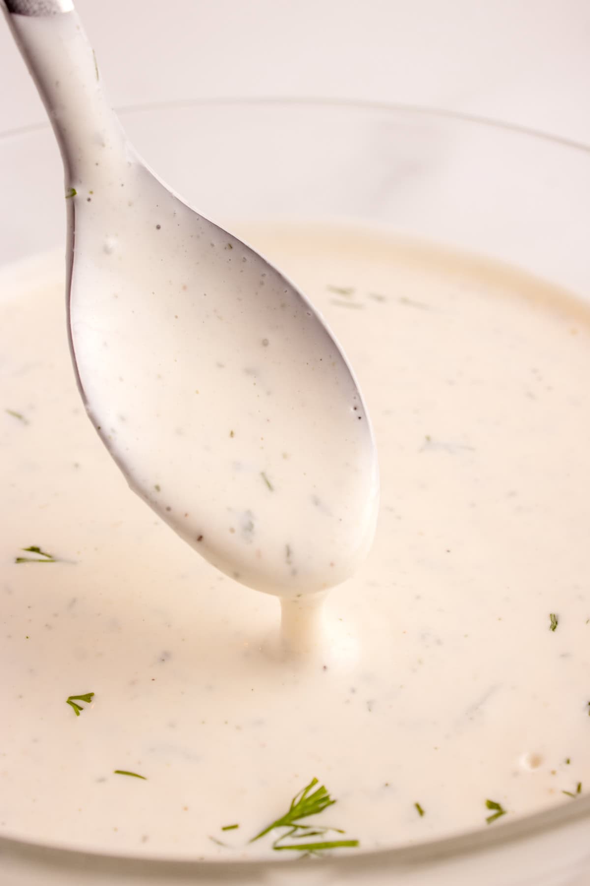 Spoon with ranch dressing