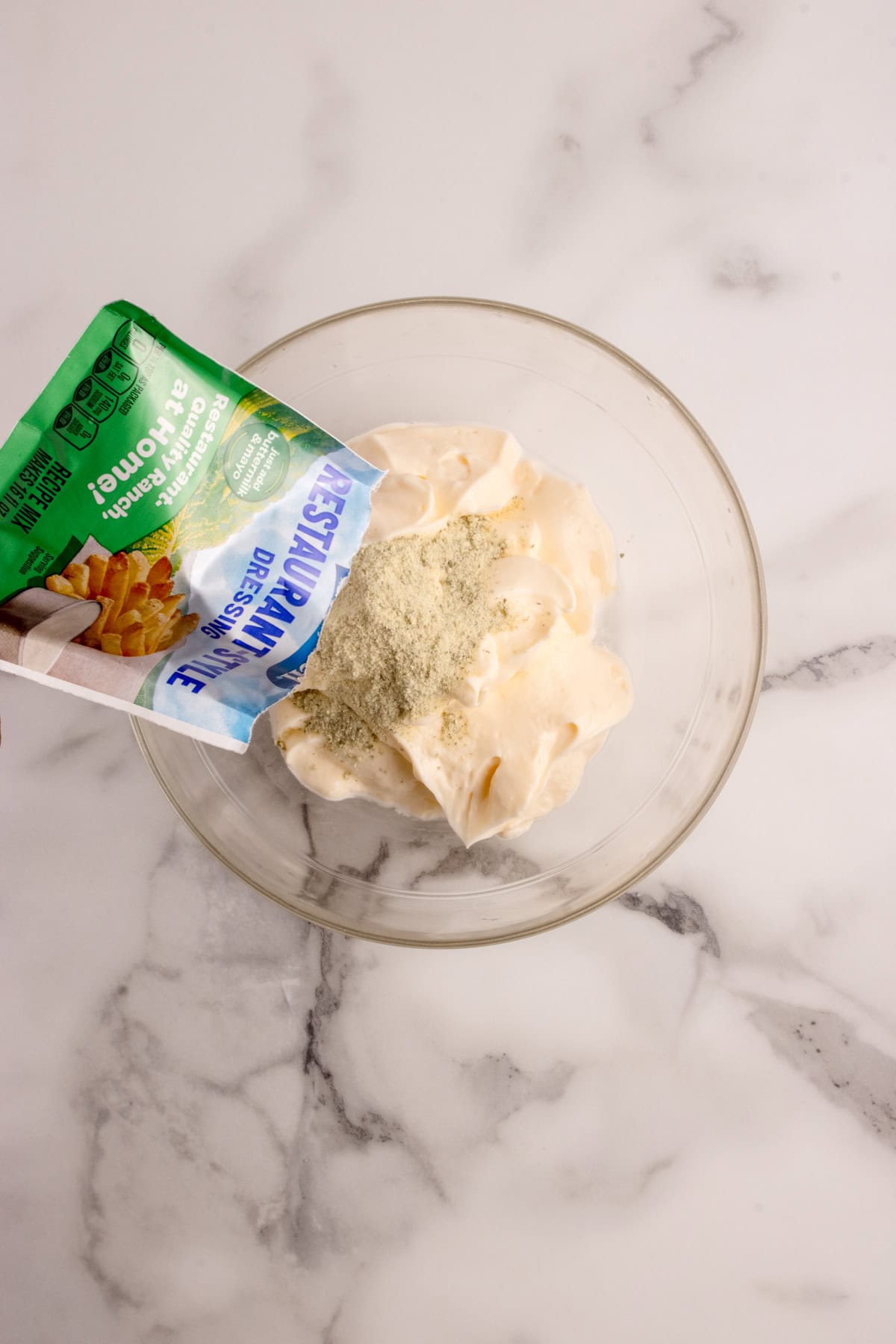 Ranch seasoning being added to mixture