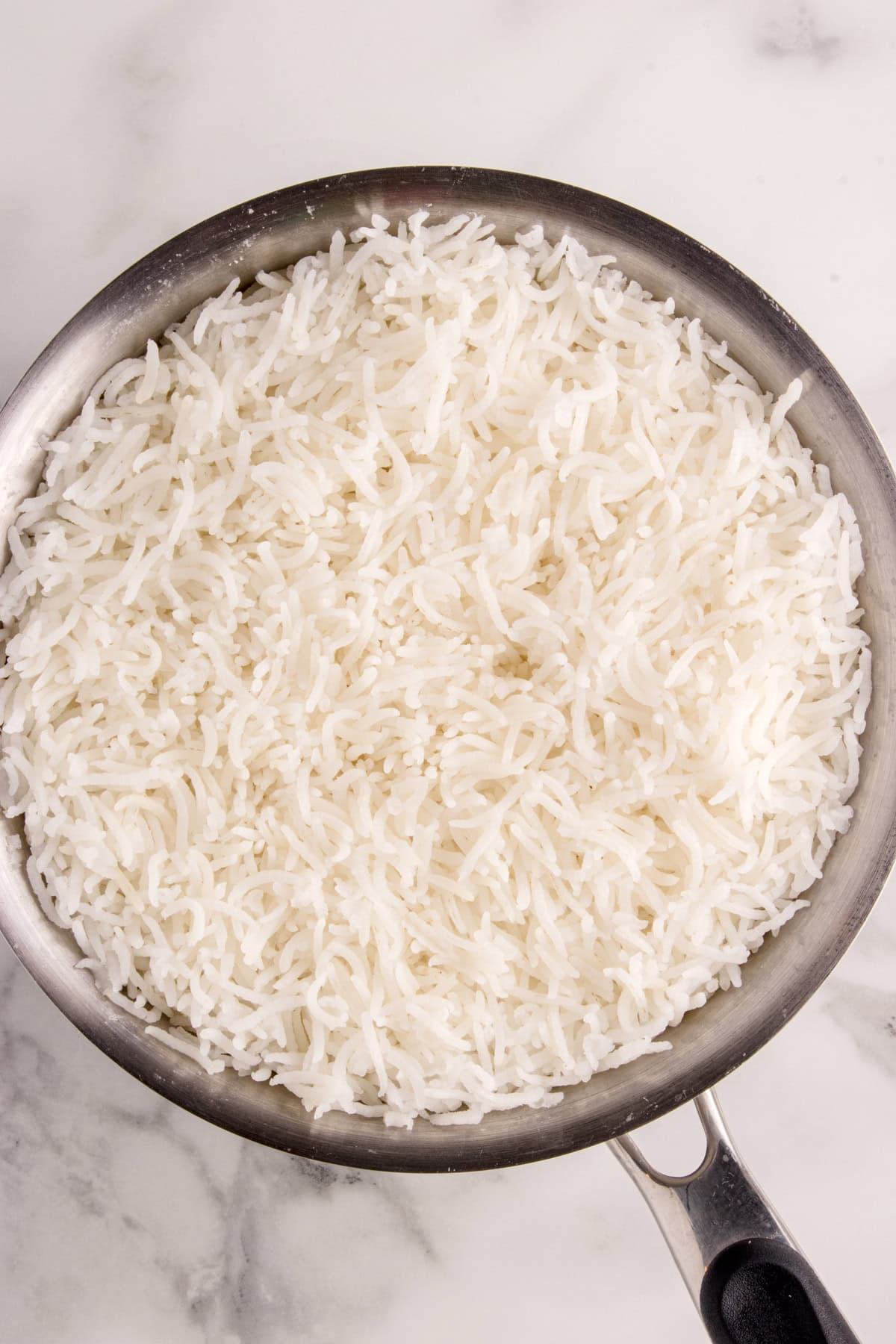 Cooked rice in a saucepan.