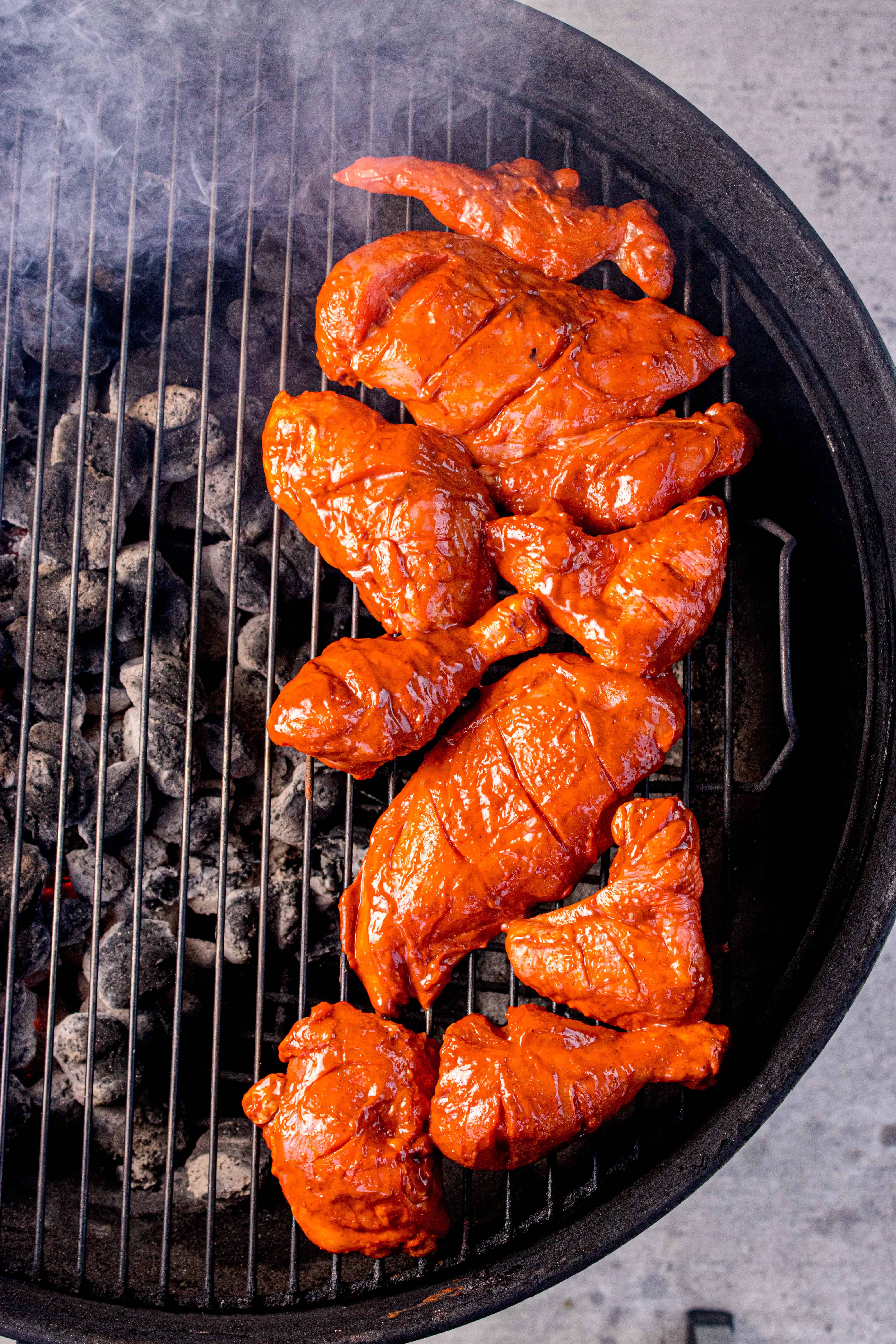 Raw chicken on a grill