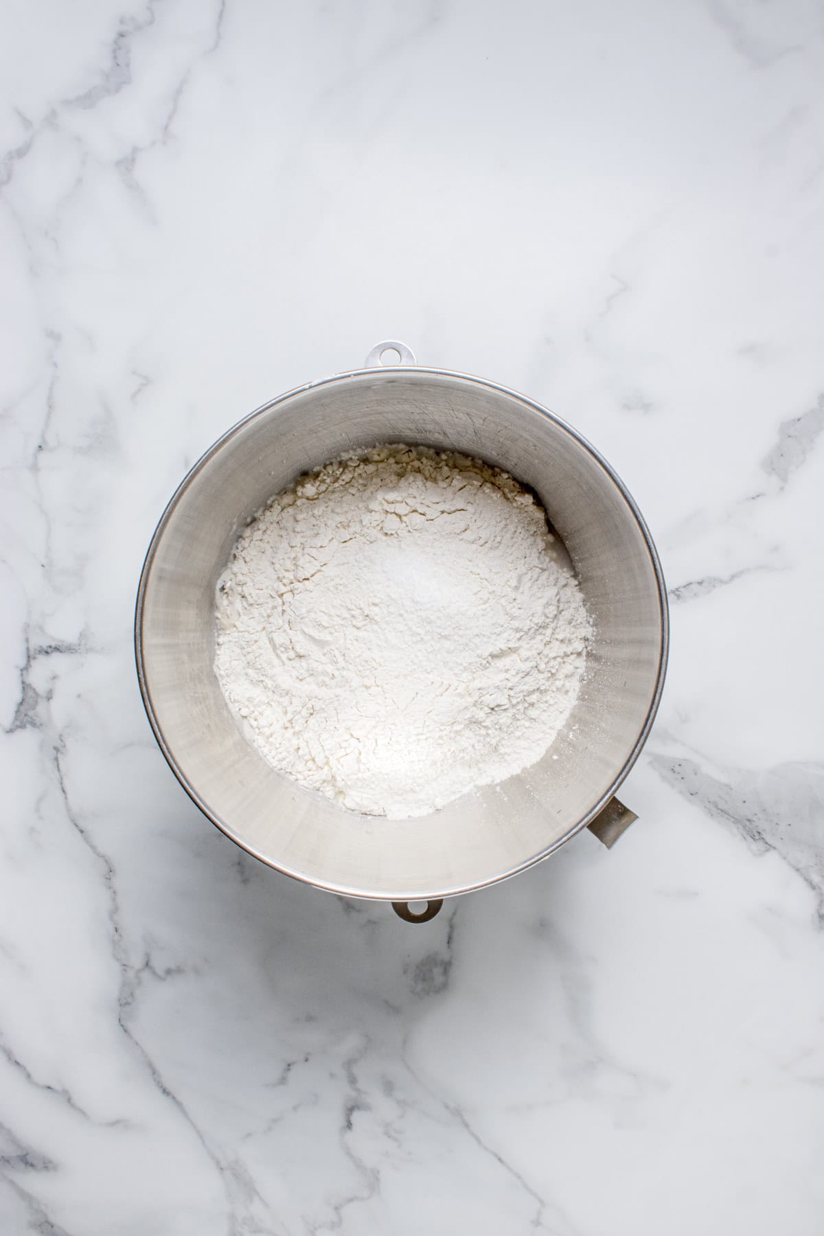 Flour and salt added to the bowl