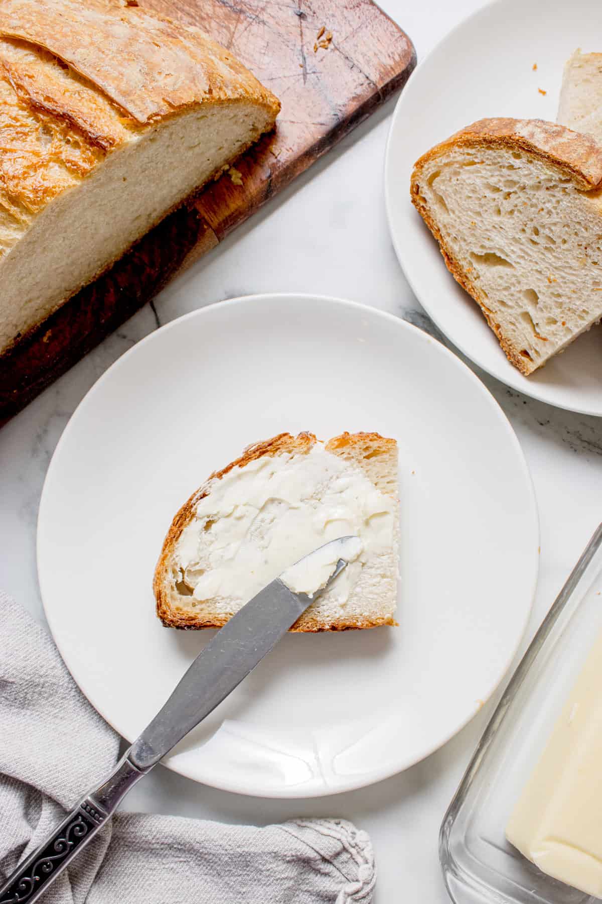 Slice of bread with butter on it