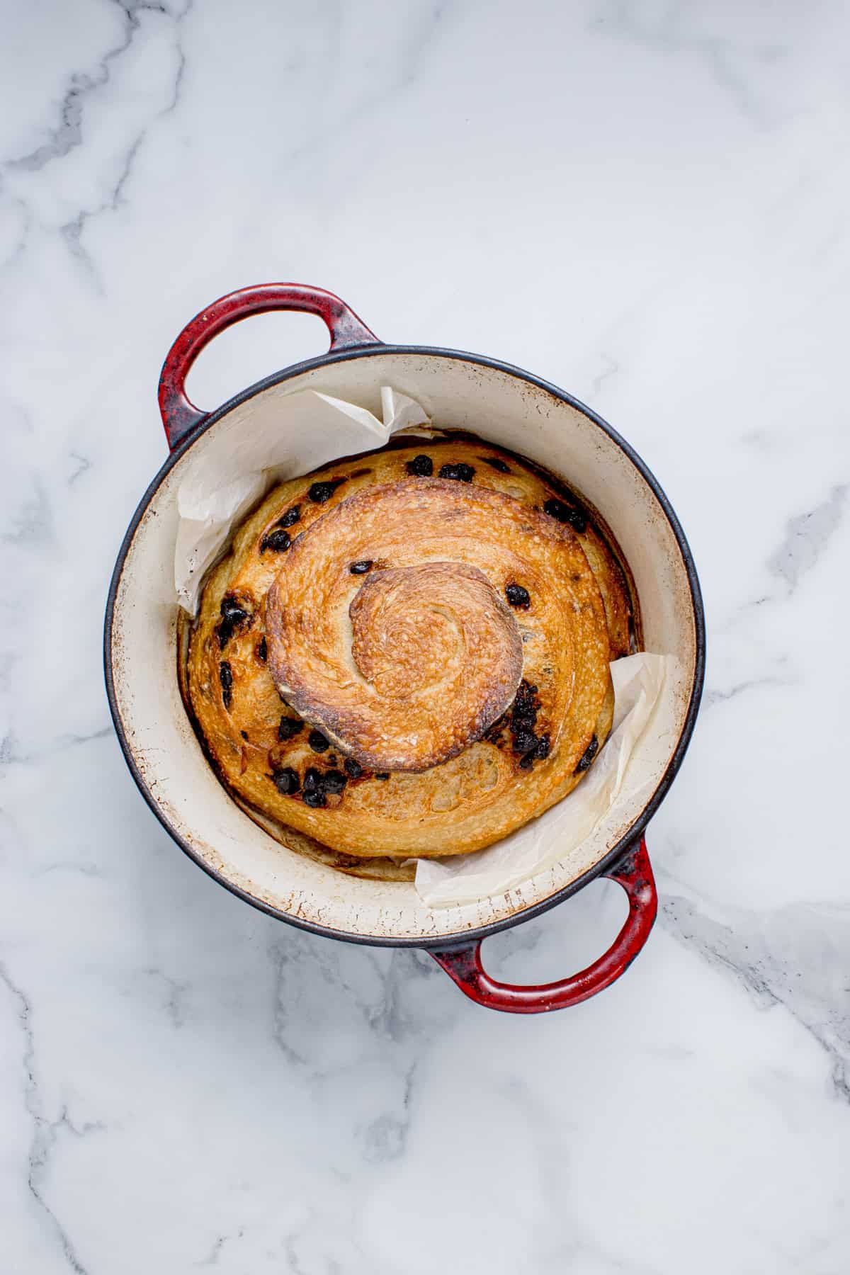 Baked dough in Dutch oven.
