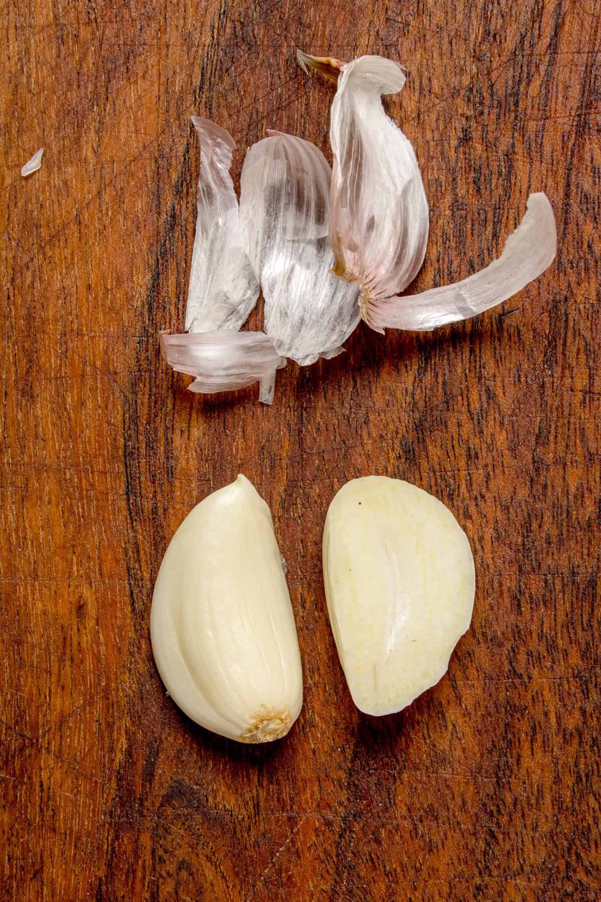 Halved and peeled clove