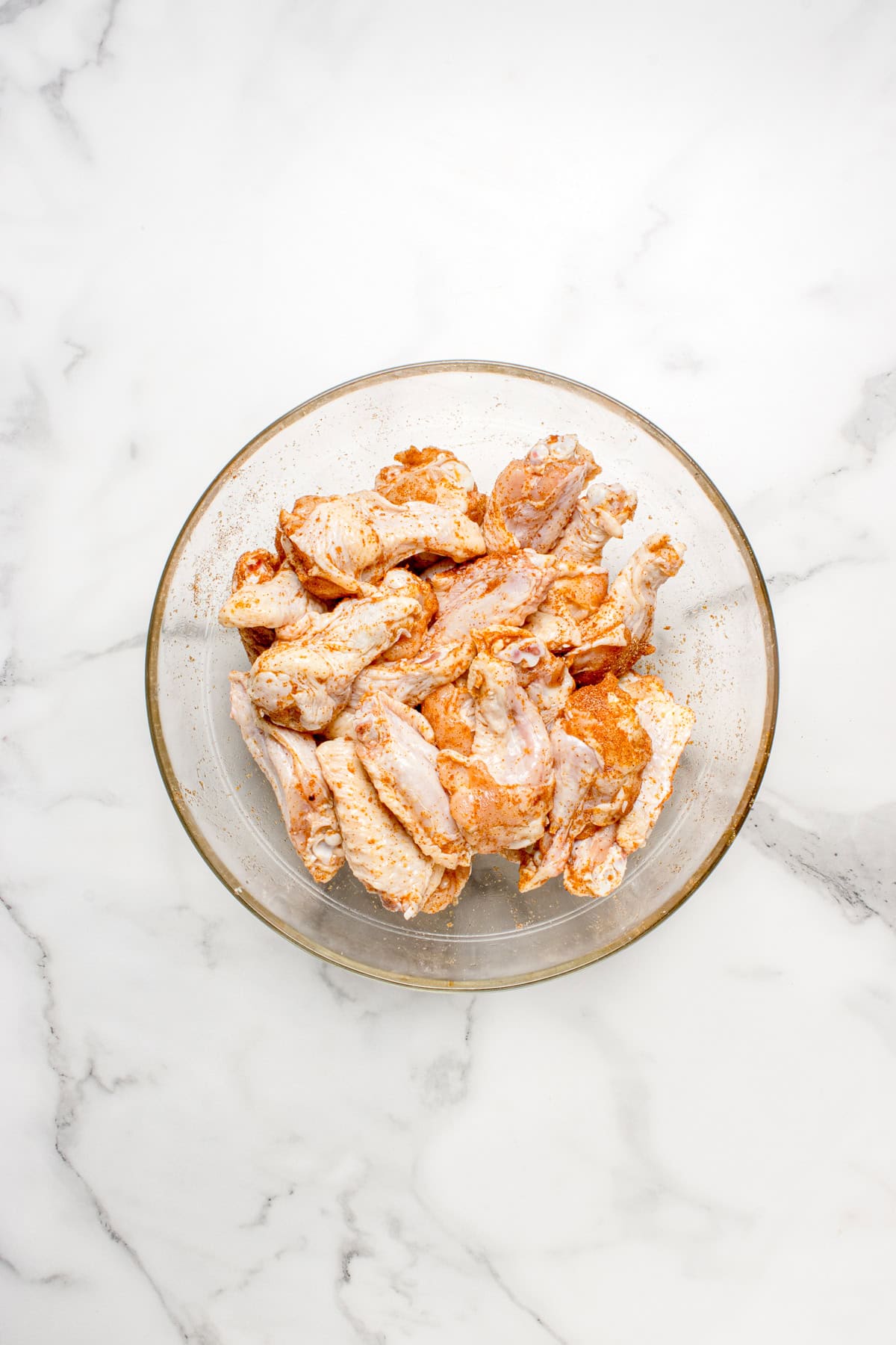 Seasoned wings in a bowl