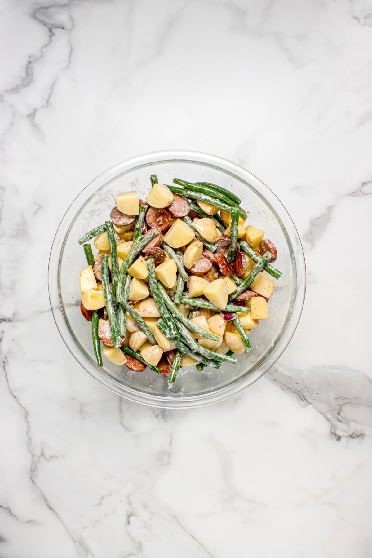 Sausage Green Bean Potato Casserole ingredients in a bowl
