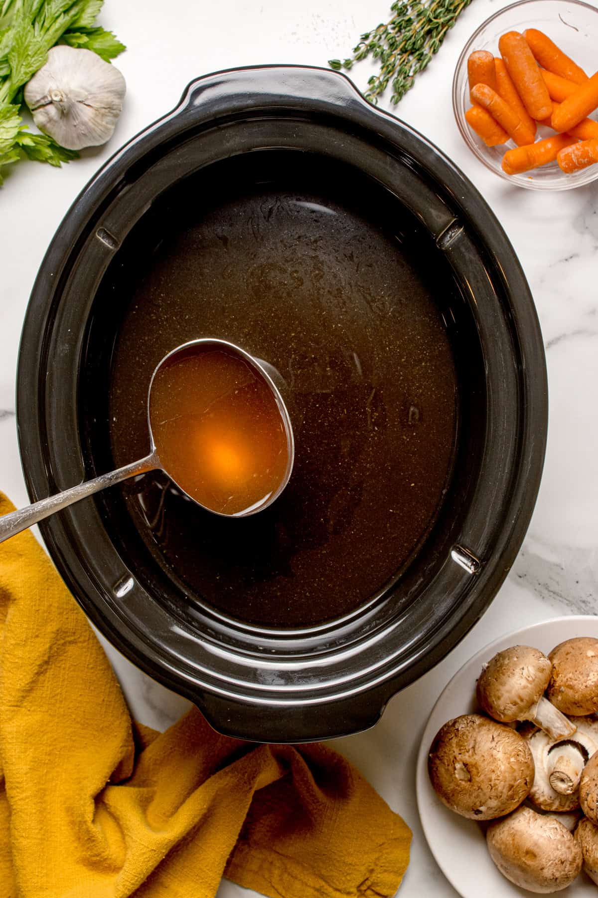 Mushroom broth in a slow cooker